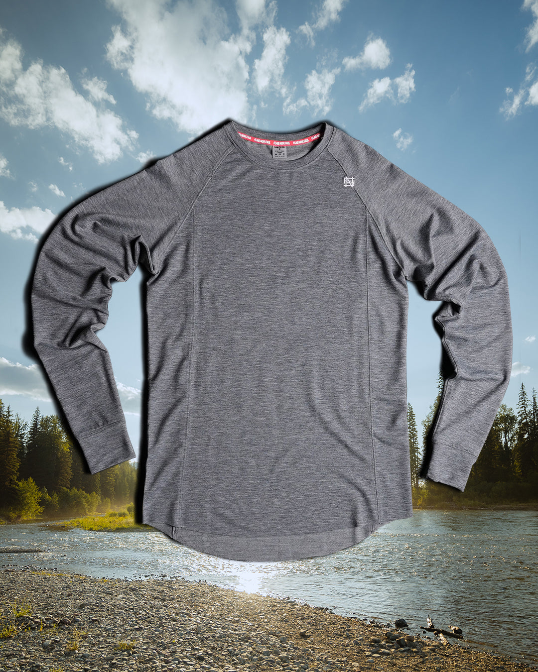 Gray long-sleeve shirt with a nature background of a lake and trees