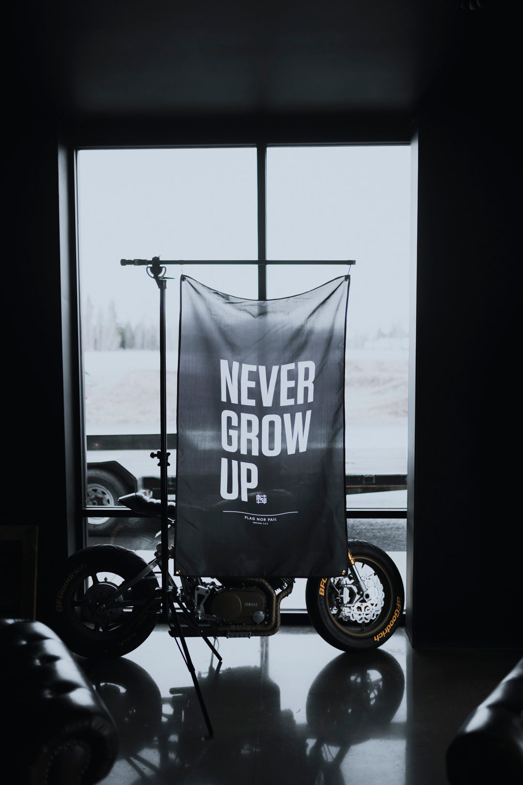 NEVER GROW UP FLAG