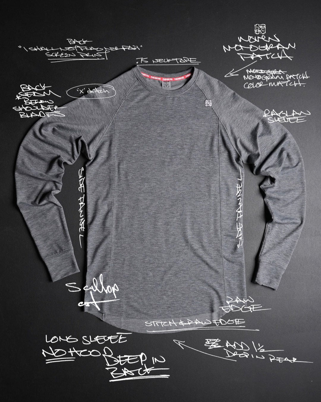 Gray long-sleeve shirt on a black background with annotations.