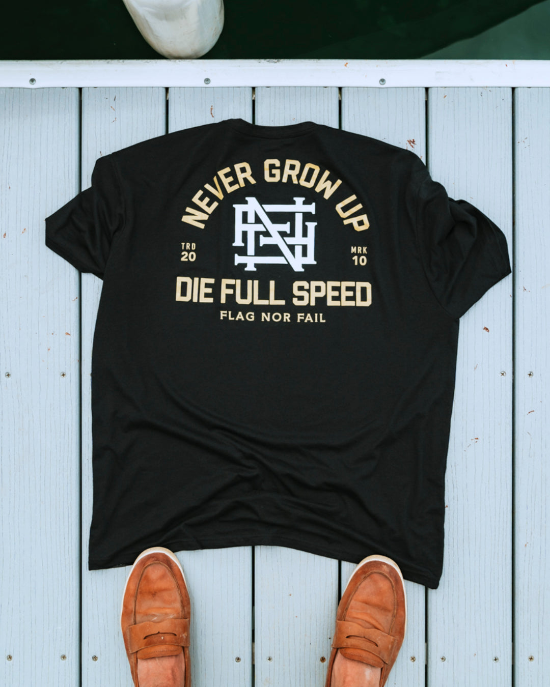 NEVER GROW UP TEE - BLACK