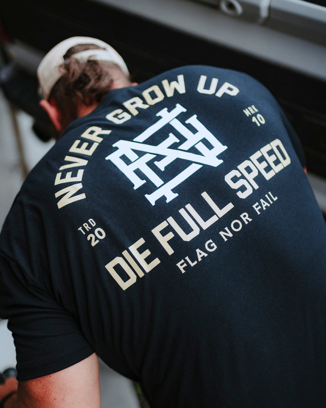 NEVER GROW UP TEE - BLACK