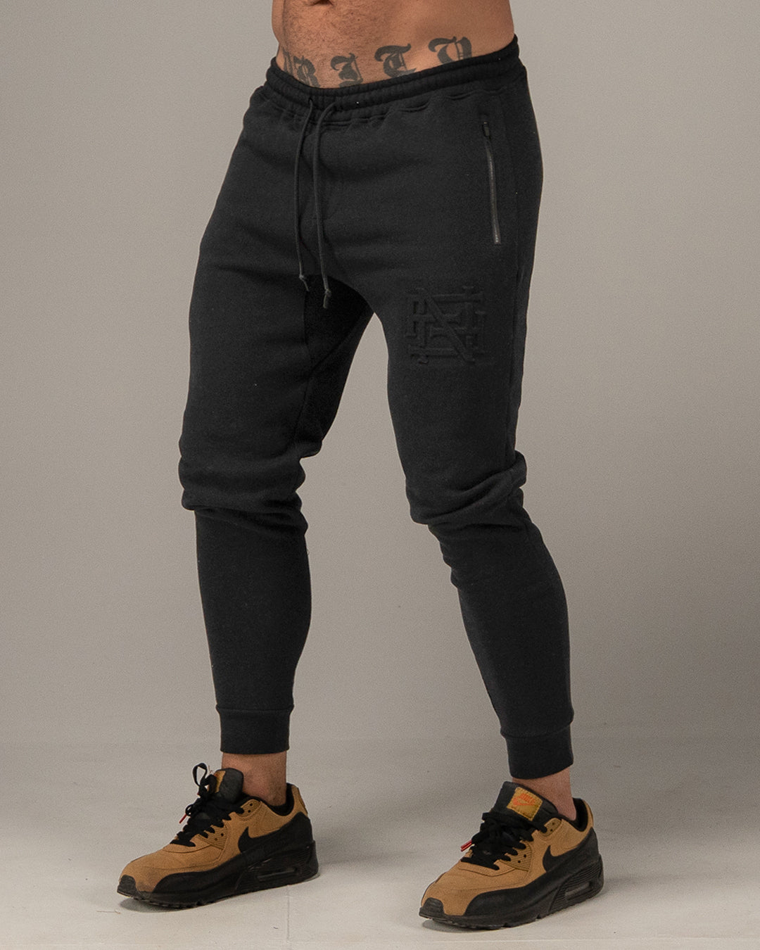 EMBOSSED FITTED JOGGERS-BLACK