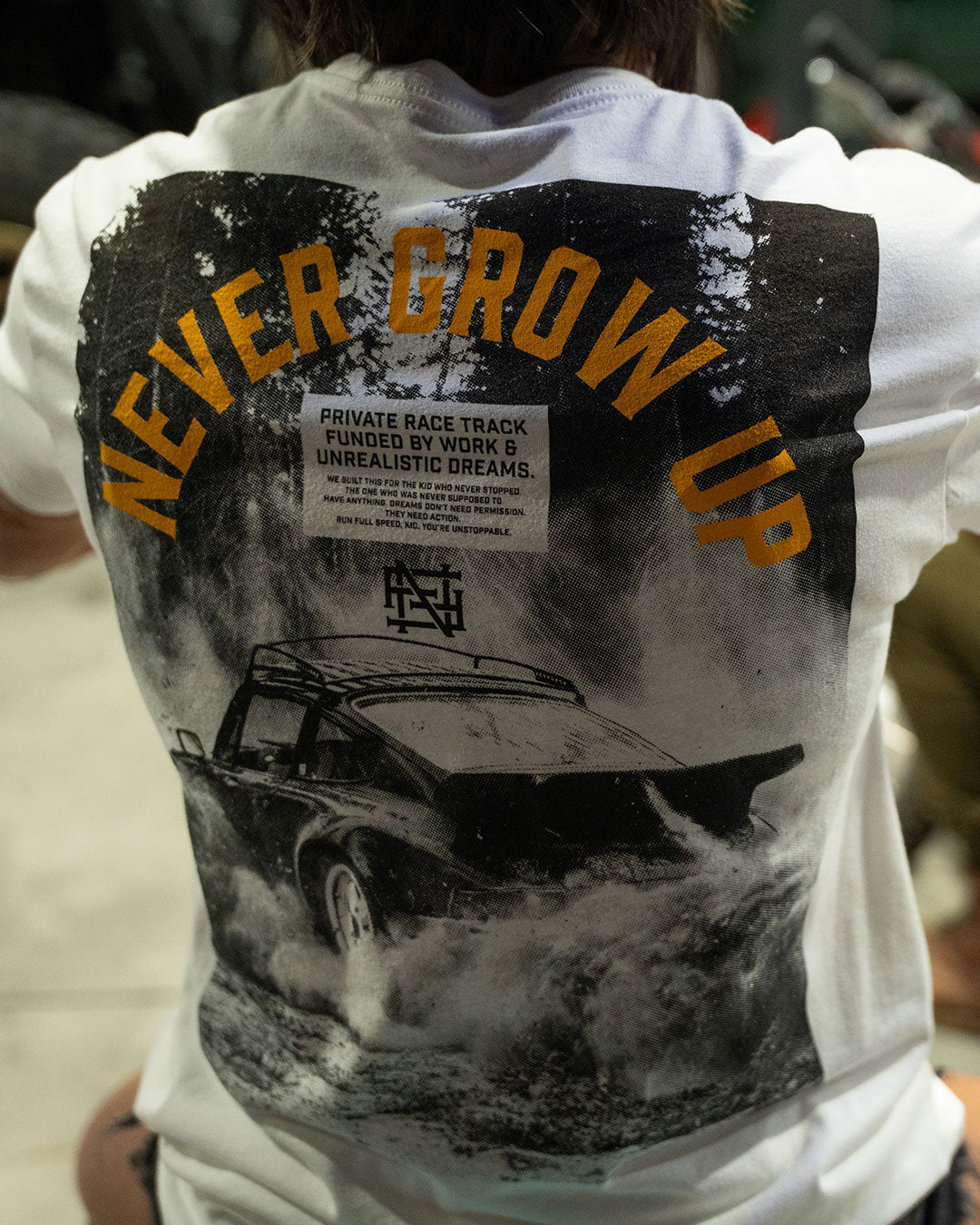 NEVER GROW UP RACE TRACK - TEE