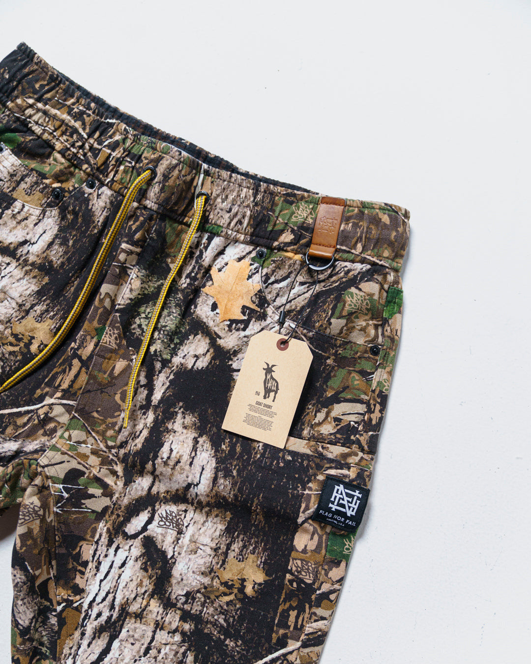 GOAT SHORTS - WOODLAND CAMO