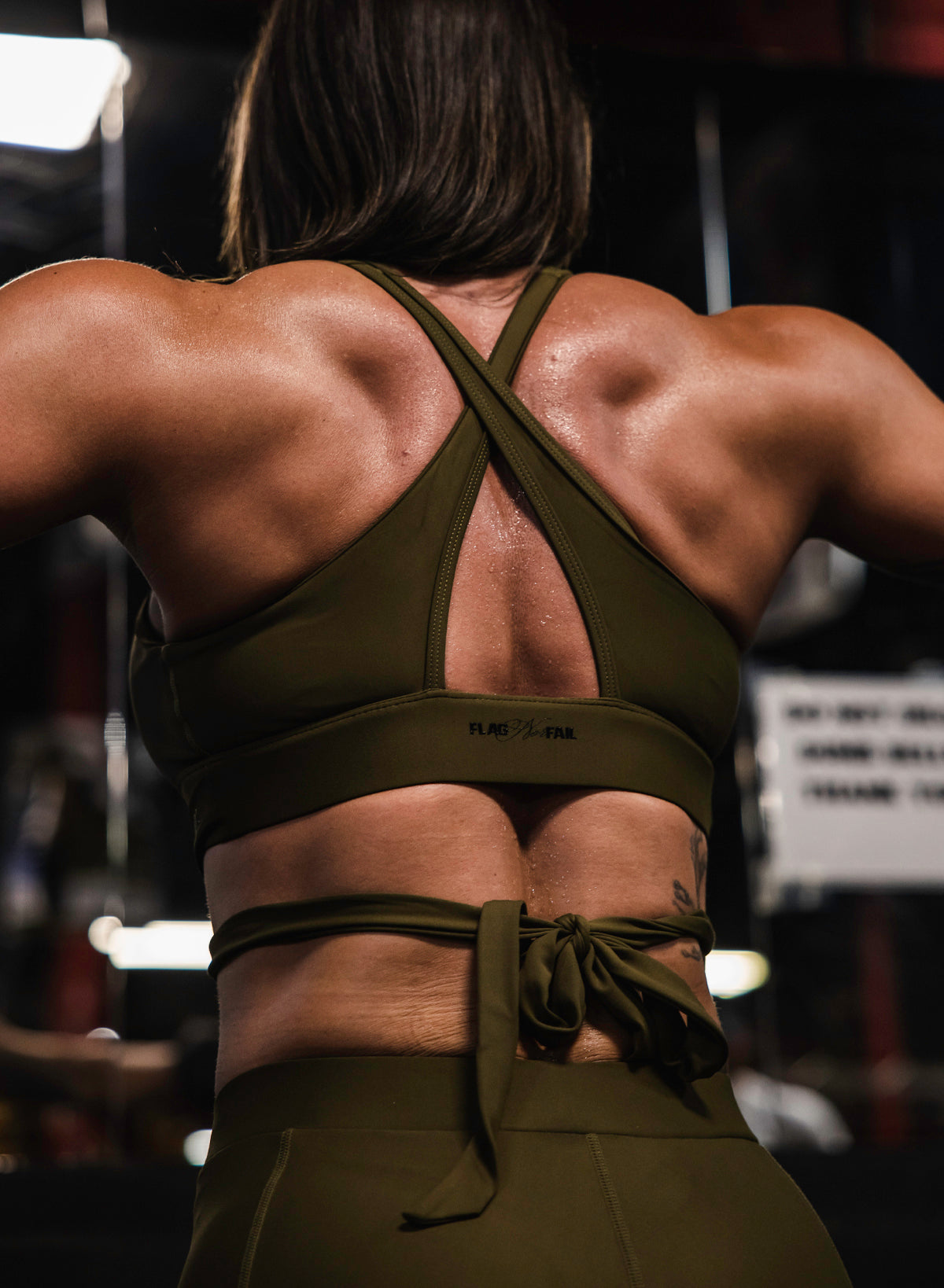 P.E Nation Fast Lane Sports Bra In Burnt Olive at Storm Fashion