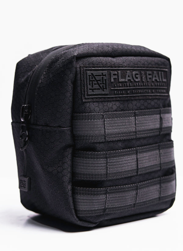 Left side of a black Apex Utility pouch.
